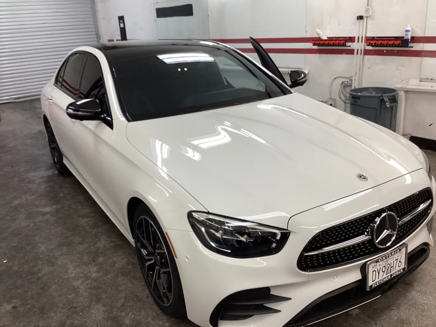 White Mercedes-Benz coupe inside Superior — window tint photo collection