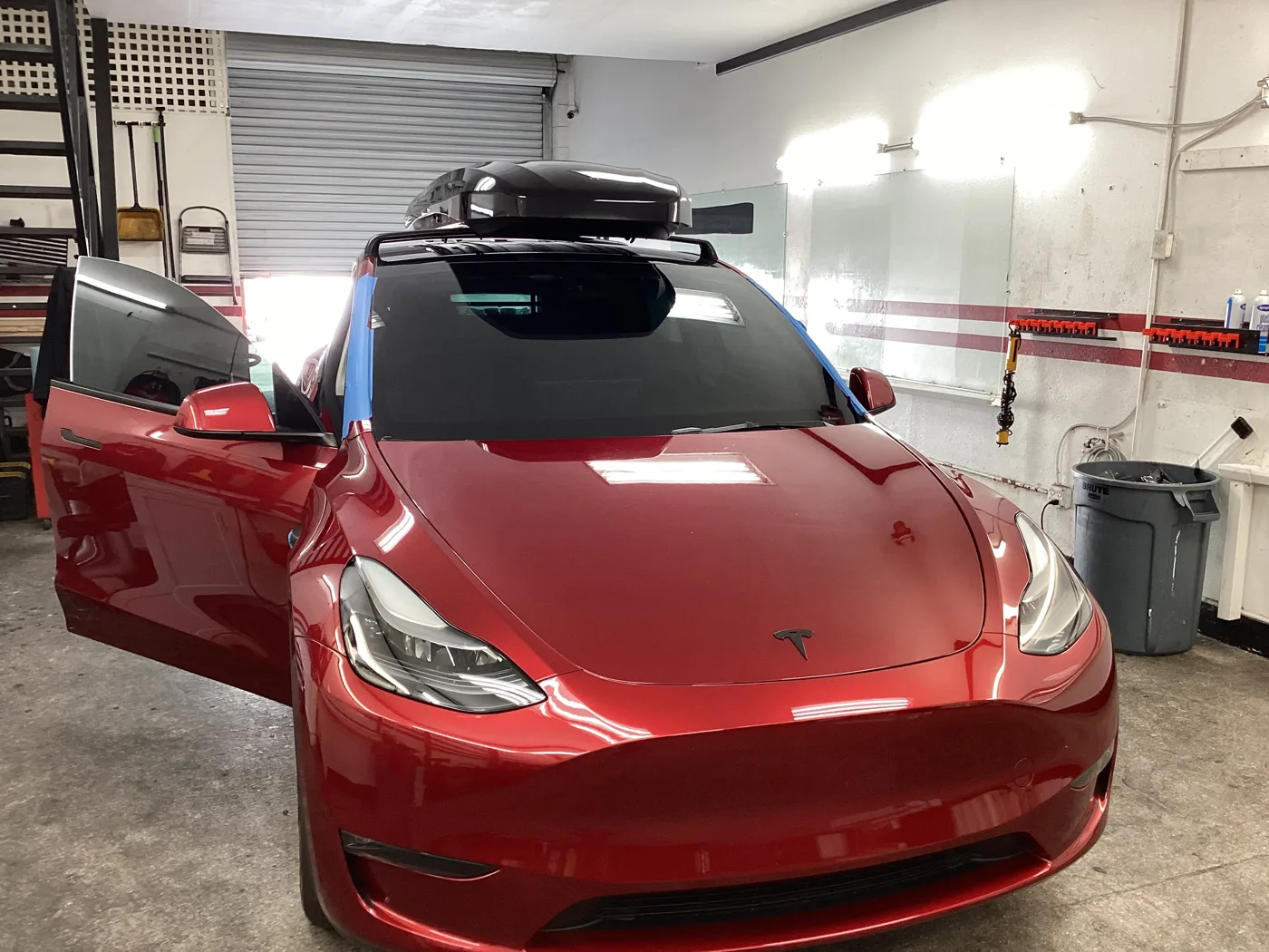Red Tesla Model 3 from Superior’s window tint photo collection in Ontario