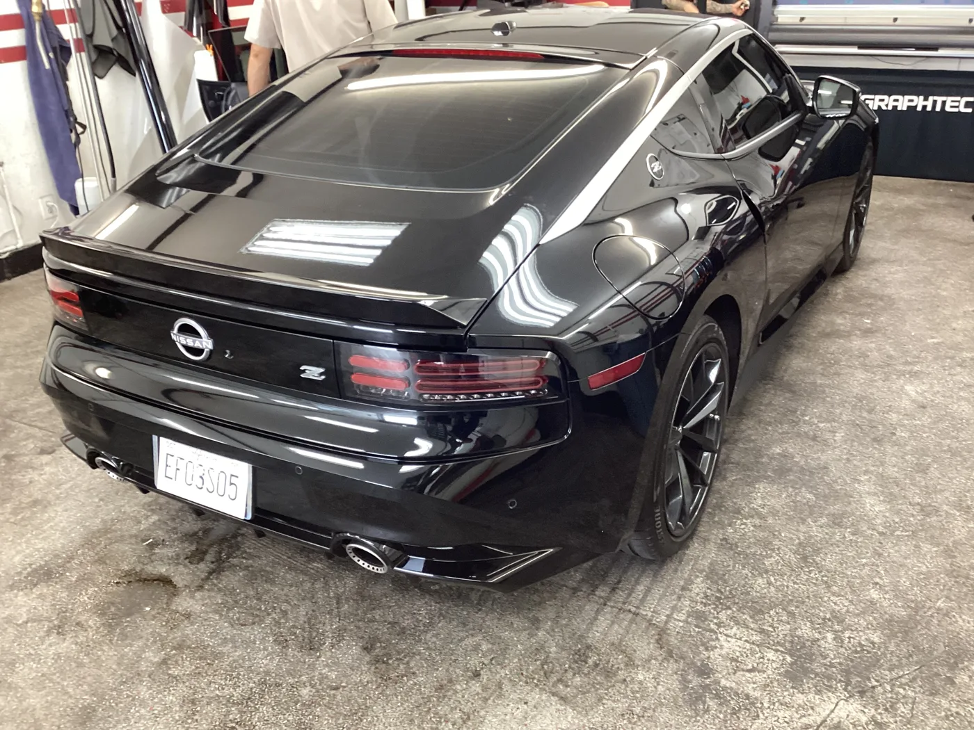 Black Nissan sedan from Superior’s window tint photo collection in Ontario